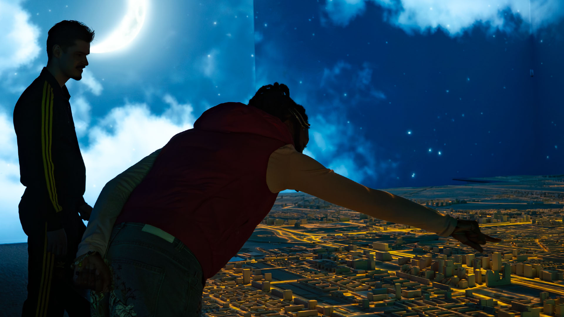 Exterior view of a red brick building at Westergasfabriek in Amsterdam, with large glass windows and traditional architecture