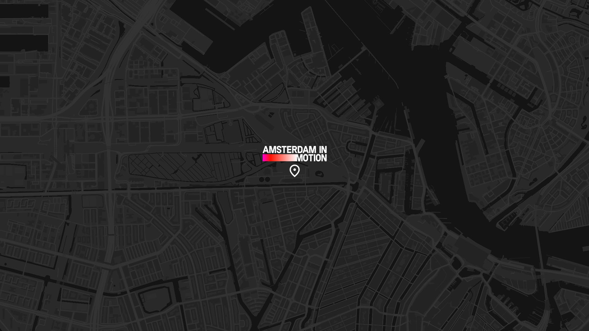 Exterior view of a red brick building at Westergasfabriek in Amsterdam, with large glass windows and traditional architecture